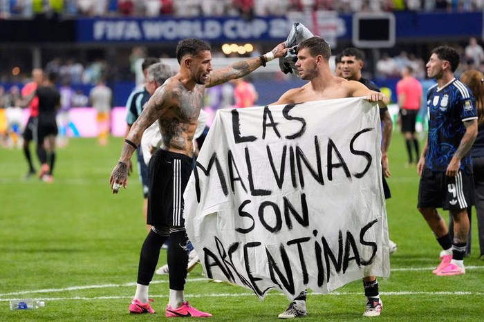 Argentina players celebrate beating England with ‘Falklands are Argentinian’ banner