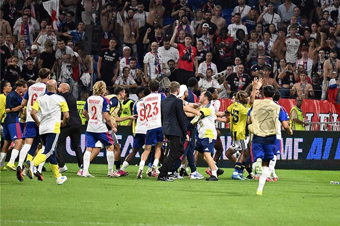 Former Arsenal star Matteo Guendouzi sparks wild brawl and fan attack in chaotic Champions League tie
